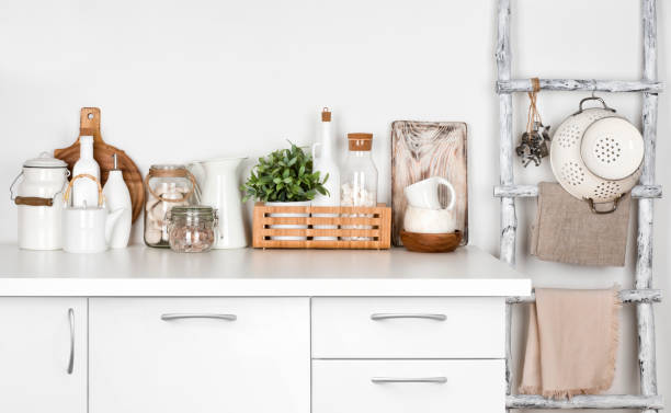 istock White kitchen bench and vintage painted ladder with various utensils 898881818