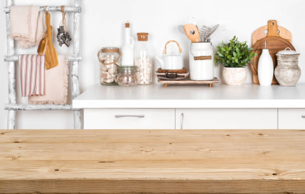 istock Empty brown wooden table with blurred image of kitchen interior 898881892