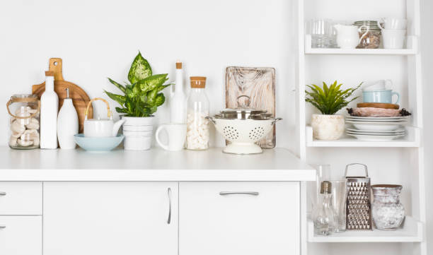 istock Kitchen bench and shelf with various utensils on white background 898882062