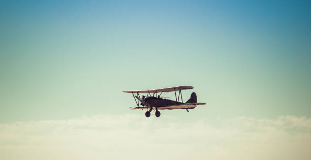 istock Biplane in the sky, in the air 898882094