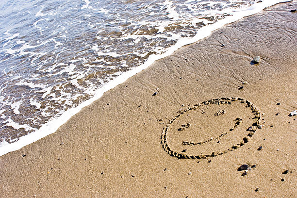Smile In The Sand stock photo