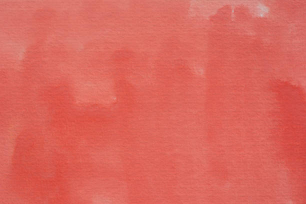 istock red watercolor painted texture background  on paper 898886160