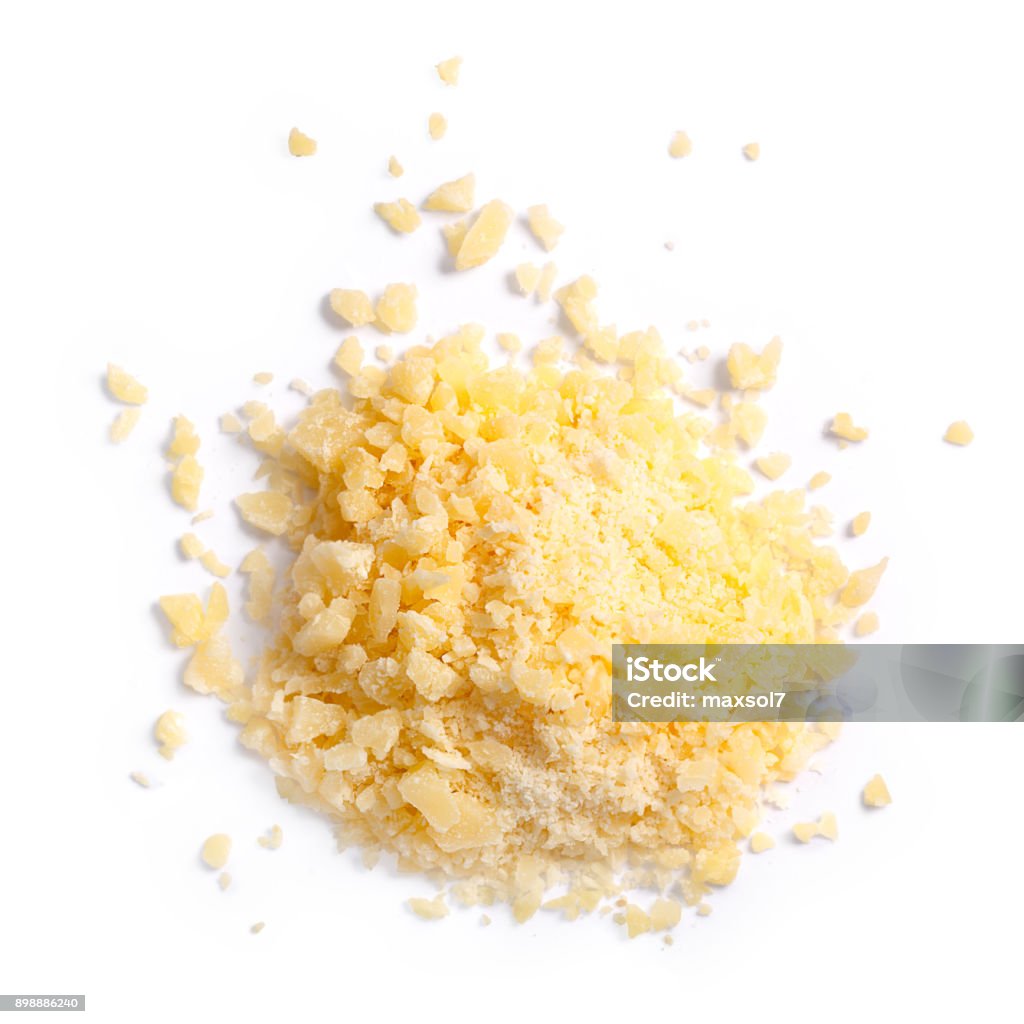 Grated parmesan grana cheese, top, paths Grated Parmesan cheese (Parmigiano, Grana), pile of, top view. Clipping paths, shadows separated Parmesan Cheese Stock Photo