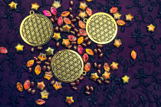 istock scattered beads and golden pendants 898886348