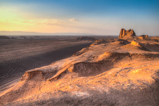 istock Sunset at the Dasht-e Lut desert near Kerman, Iran 898889458