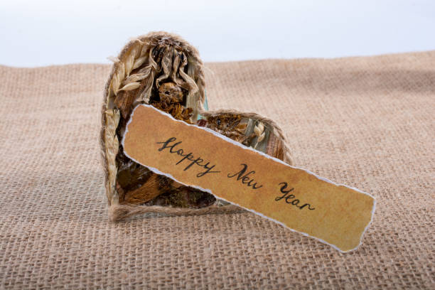 istock Happy new year written on a torn paper 898889696