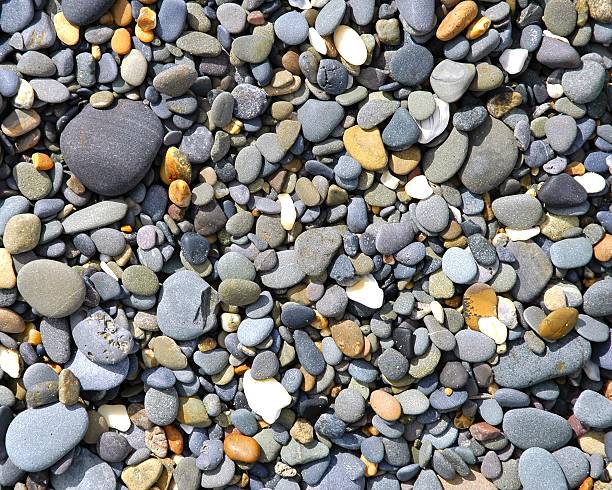 istock smoothed pebbles on the beach by ocean 89889273