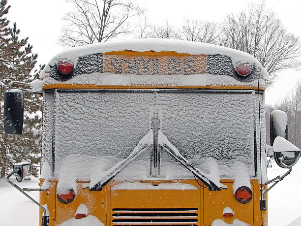 istock Front View of Snow Covered Yellow School Bus 89889581