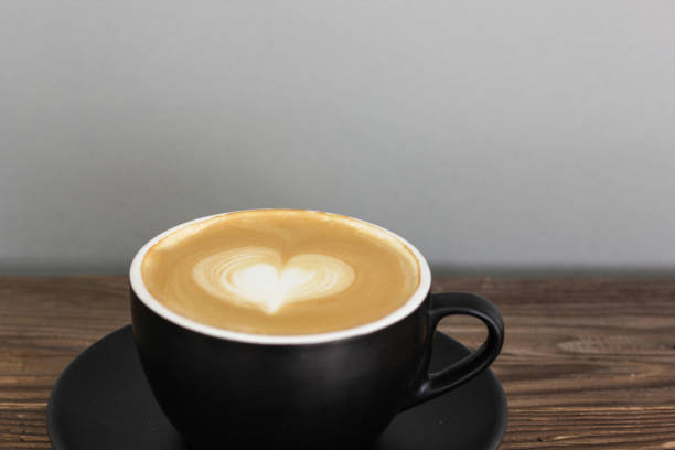 istock The coffee latte on wooden table 898898082
