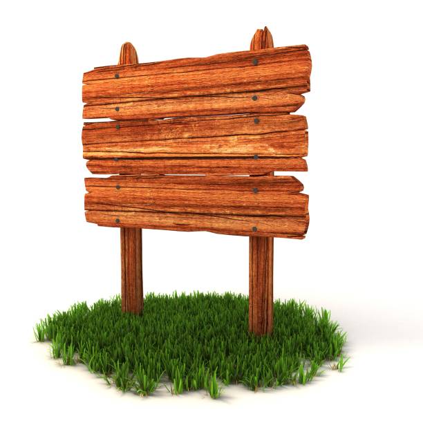 istock Old wooden billboard on the grass isolated on white background 898898198