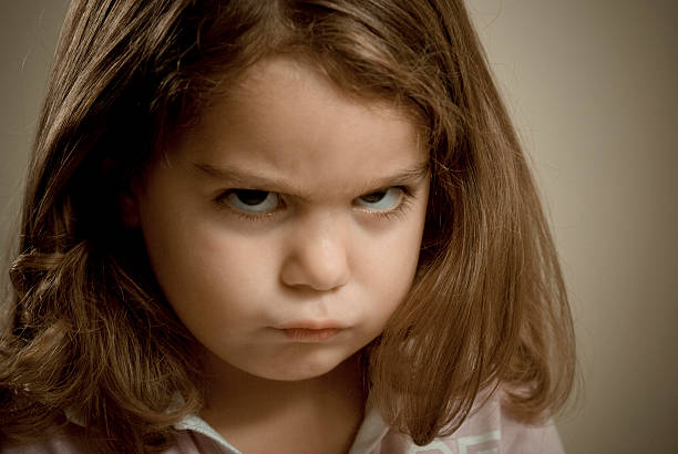 Angry Little Girl stock photo