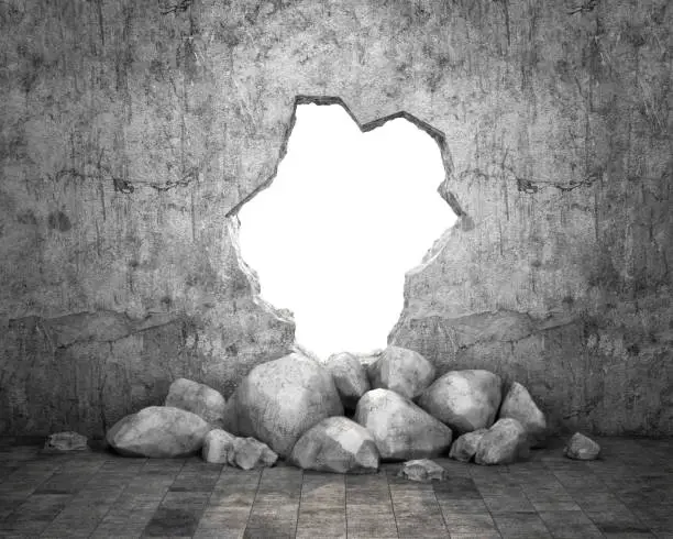 Photo of Destroyed wall of concrete structure. Concept of escape to freedom