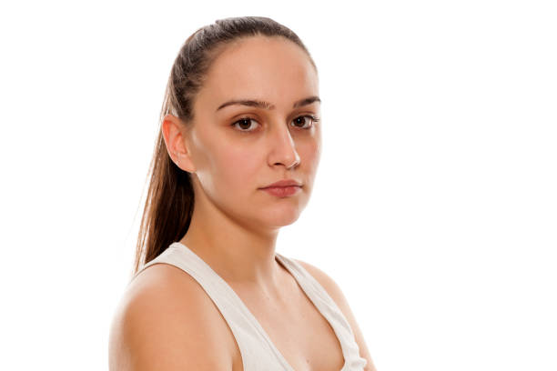 istock beautiful young woman posing without makeup 898902768