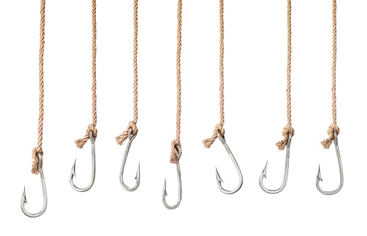 Set of fishing hooks on the ropes isolated on a white background