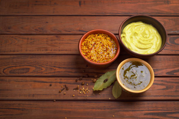 istock bowls with sauces on a wooden background 898907336