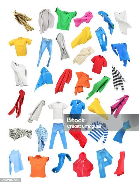 Colored Clothes In The Fall Isolated On White Background Stock Photo - Download Image Now