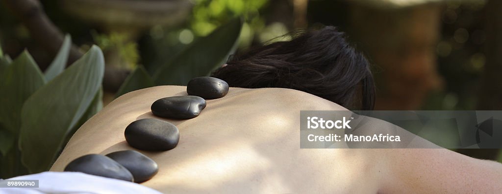 Hot Rock Spa Treatment  Massaging Stock Photo