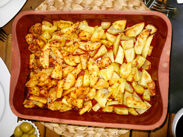 istock in casserole, sauce, spicy potatoes. 898911846