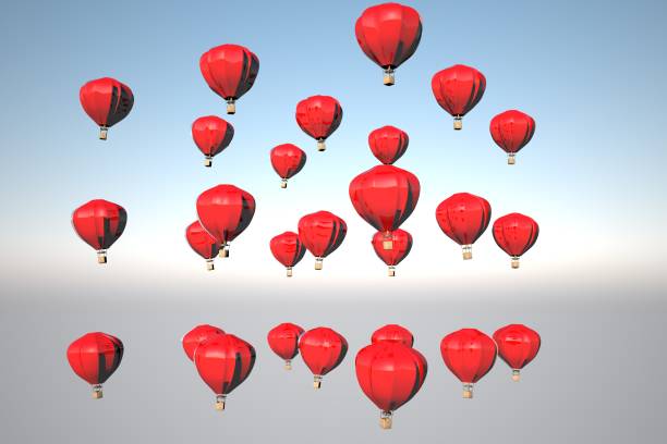 istock Red montgolfiers flying in the sky 898917108