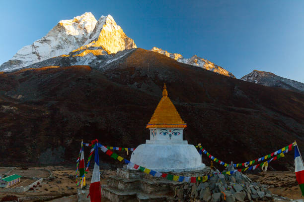 istock Buddhist stupa on mountain trekking path in Himalayas, Nepal. 898929020