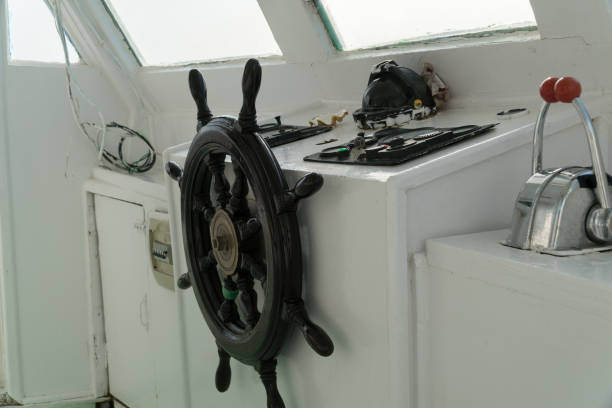 Fishing industry: wooden trawler bridge and helm in the Mediterranean Sea