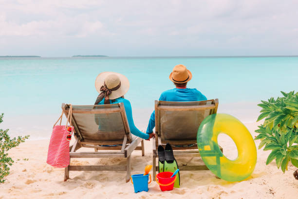istock happy couple relax on a tropical beach 898932268