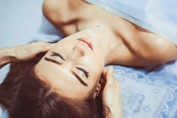 istock face massage in Spa salon 898932640