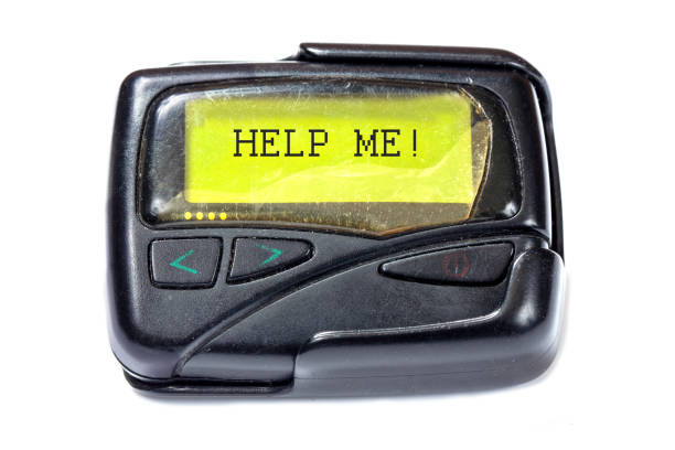 istock Old pager on a white background. The message on the screen: Help me 898934138
