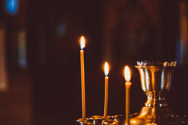 istock candles in the Church 898940930