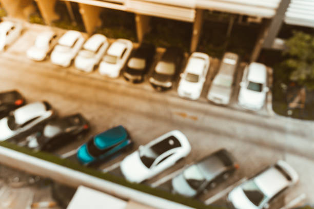 istock Abstract blurred outdoor car parking 898943000