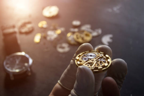 istock Watchmaker is repairing the mechanical watches in his workshop 898945448