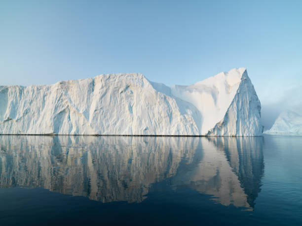 istock Sunset on Arctic Icebergs on Arctic Ocean in Greenland 898945918