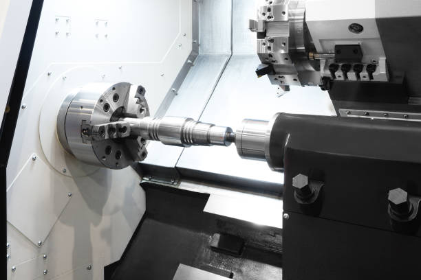 istock Manufacturing professional lathe machine . Industrial concept. Programmable modern digital lathe with digital program control, turret type blade holder 898946204