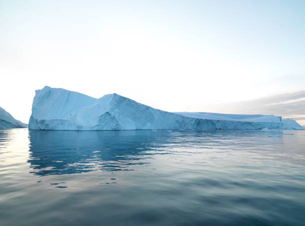 istock Sunset on Arctic Icebergs on Arctic Ocean in Greenland 898954474