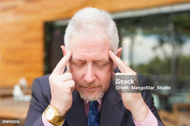 Closeup Of Thoughtful Business Man Outdoors Stock Photo - Download Image Now - Adult, Adults Only, Business