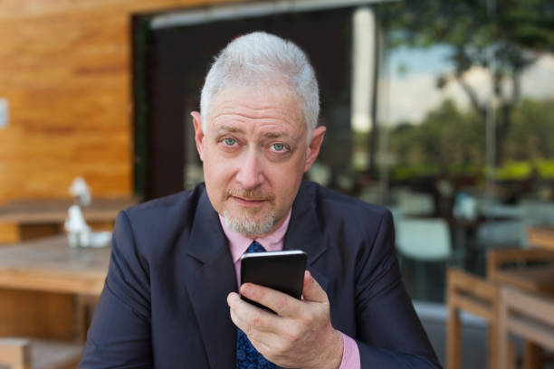 istock Serious Business Man Making Video Call Outdoors 898955170