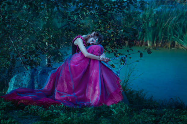 Elf woman in purple dress with harp in hands