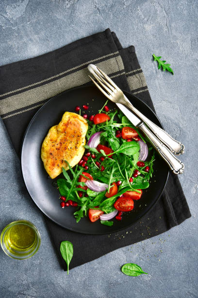 istock Grilled chicken breast with vegetable salad 898958992