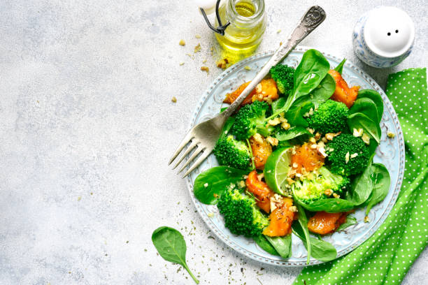 istock Pumpkin salad with spinach and broccoli 898959106