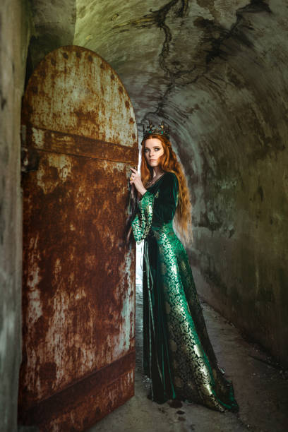 istock Woman in green medieval dress 898963190