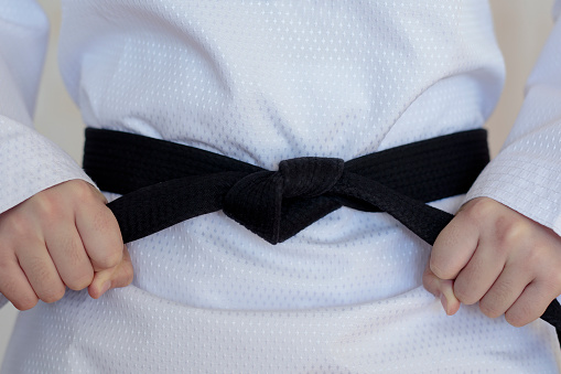 The taekwondo girl with black belt