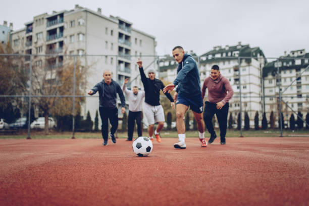 istock Friends Playing Urban Soccer 898963816