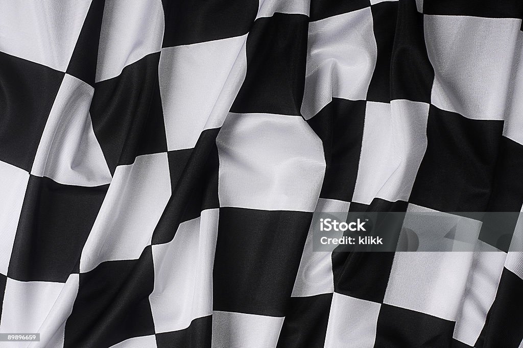 Real machający Flaga w szachownicę - Zbiór zdjęć royalty-free (Wyścigi samochodów seryjnych)