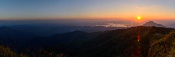 istock Panorama View peak of high mountain in sunset time 898966690