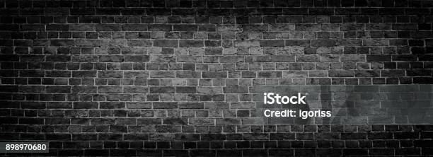 Black Old Brick Wall Panoramic Background In High Resolution Stock Photo - Download Image Now