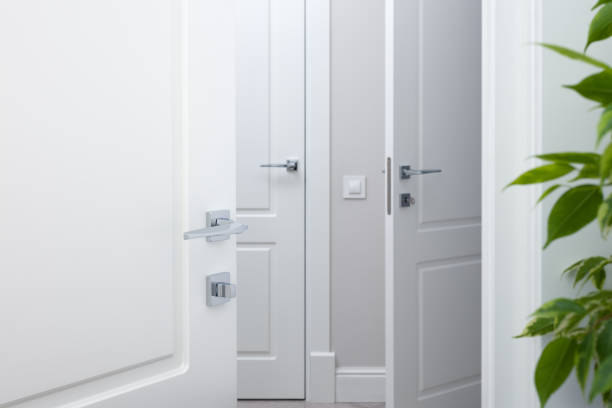 istock Open the white door into the corridor 898971688