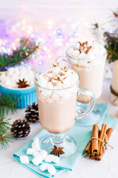 istock Hot cocoa with marshmallow and ground cinnamon in glasses 898975532