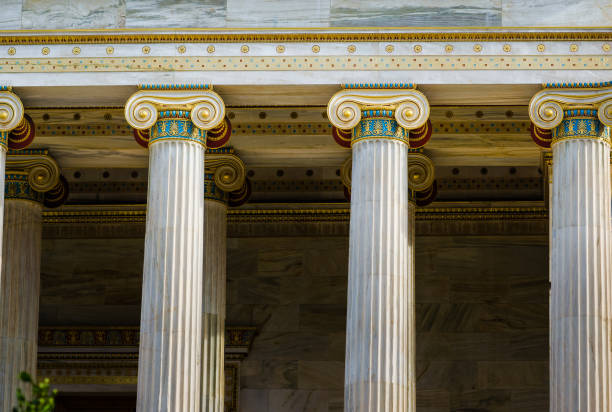istock Classical ancient Greek columns of pure marble with gilding. 898979318