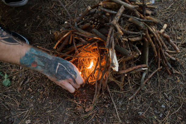 istock Bonfire preparation tourism nature forest concept. 898980140