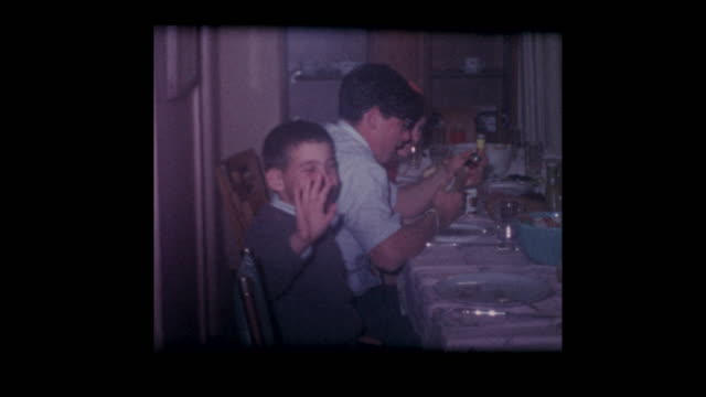1960's Family around Thanksgiving dinner table